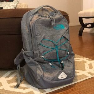 Grey and teal North Face jester style backpack